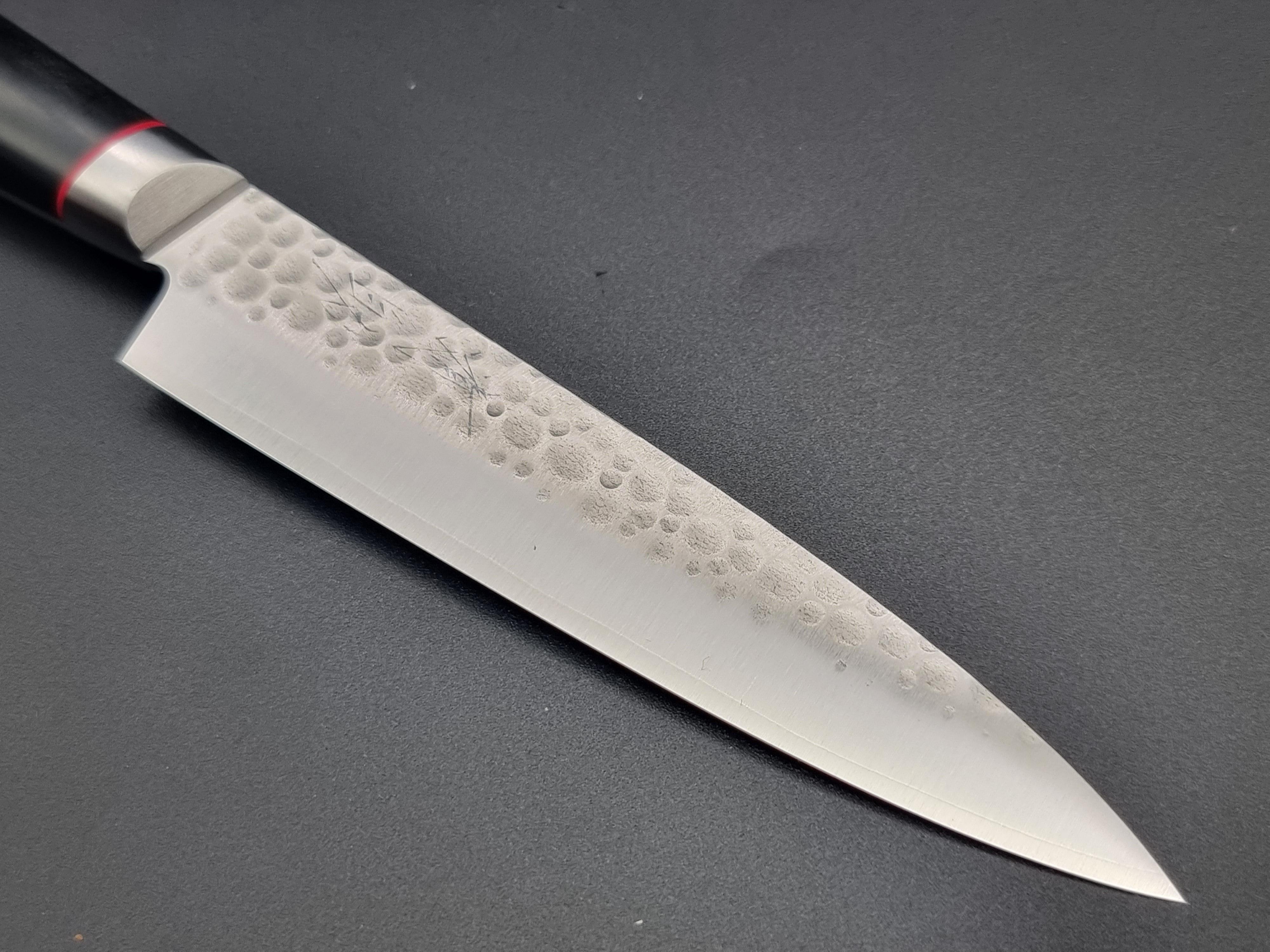 https://thesharpchef.co.uk/cdn/shop/files/seisuke-hamono-vg10-hammered-120mm-petty-the-sharp-chef-3.jpg?v=1689804632